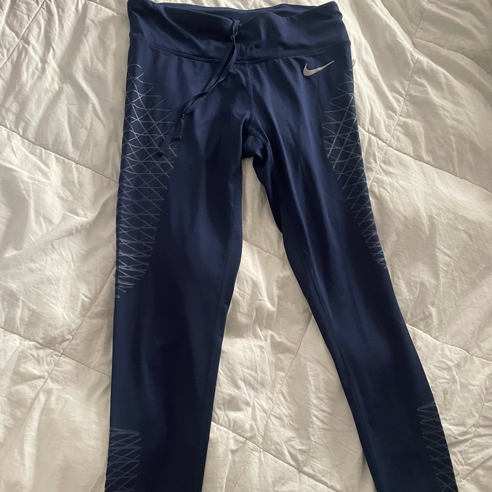 Nike leggings zippered back pocket textured detail drawstring athletic wear